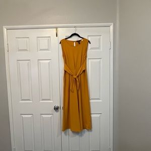 Dujour sleeveless, cropped, wide leg jumpsuit with attached belt, size XS